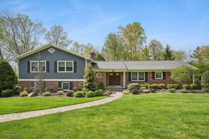 Meticulously maintained 4-bedroom, 4.1-bath split-level home ideally located in the heart of Deerfield. The renovated kitchen (2020) features modern finishes and flows seamlessly into a spacious family room with a fireplace and custom built-ins, perfectly connected to the dining room for effortless entertaining. The inviting living room offers a wood-burning fireplace and sliding doors that open to a deck overlooking the yard. The primary suite includes a full bath and a walk-in closet, while the newly finished basement provides additional living space with a full bath and abundant storage. Additional highlights include a two-car garage, underground sprinkler system, and a security system for added convenience and peace of mind.