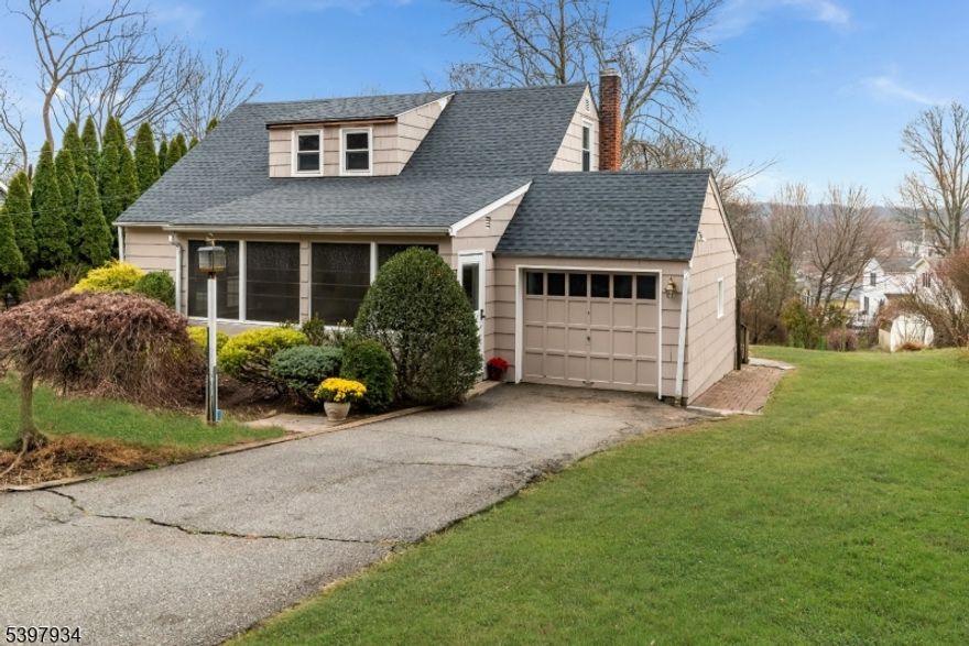 Great Opportunity! Just moments from shopping, dining, and major commuter routes including NYC direct trains in one of Morris County's most desirable towns with its highly rated schools and many community events. This 4 bedroom wood shingled home with its open floor plan kitchen with large bay window that over looks the large grassy back yard and stone patio offers so much potential. There is both a front and back enclosed porch offering additional space to enjoy. The full basement has a work room, a bonus room that can be converted to a home office and a rec room area. The roof is brand new! Don't miss this opportunity to make this home your own!