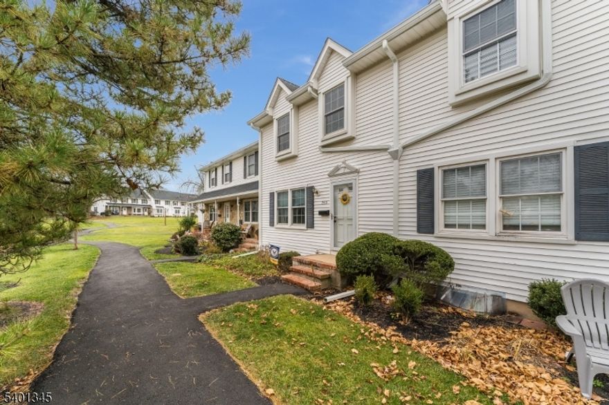 Spacious interior condo with 2 bedroom and 1.5 baths.  Large Eat in Kitchen with fireplace and access to fenced in patio area.  Dining room has built ins flanking entrance to kitchen area.  Large 2nd floor bedrooms with shared hallway bath.  Large full basement is perfect for extra storage.