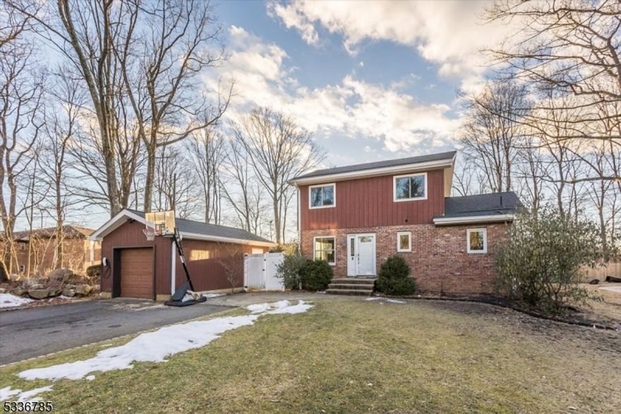 Welcome to 8 Carteret Ave, a beautifully updated 4-bedroom, 2-bath colonial nestled on a quiet dead-end street in the heart of Mt. Olive. This home combines modern updates with classic charm, offering cherry hardwood floors throughout the first level and a cozy wood-burning stove for those chilly evenings. The roof, flashing, and gutters are only 8 months old. Both bathrooms have been updated with radiant heat flooring. French doors lead out to the large deck. The updated, kitchen features stainless steel appliances and a stylish backsplash.  Upstairs, you'll find spacious bedrooms with ample natural light, perfect for comfortable living. Outside the location can't be beaten just steps from Turkey Brook Park, convenient to shopping, restaurants, NYC transit, and major highways. Subject to the seller finding a suitable home.