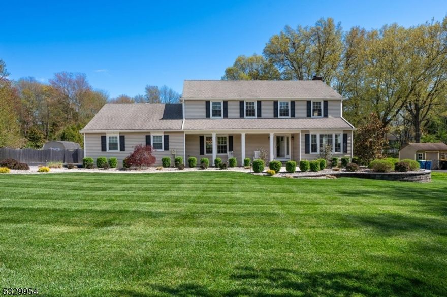 Meticulously updated 5-bedroom colonial situated on a private 1.24-acres. New walkway to the covered front porch. Foyer flows seamlessly to the formal dining room. Updated custom kitchen features quartz countertops, maple soft-close cabinets with custom molding, under-cabinet lighting, high-end stainless steel appliances, a double wall oven, and beverage fridge. Breakfast area with sliders that open directly to the backyard. Living room with gas fireplace flanked by custom built-in cabinetry. Mudroom with large pantry and built-in benches and cubbies. Completing this level is a dedicated office, laundry room, and updated powder room. Custom window treatments and recessed Sonos speakers are found throughout the first floor. Upper level boasts a primary suite with enormous walk-in closet and fully updated en-suite bathroom as well as four additional bedrooms and another updated full bath. Finished basement with enormous rec room ready to be customized to your needs, plus abundant storage areas. The incredible backyard is designed for luxury entertaining. It boasts a free-form heated pool, a fully equipped pavilion featuring a custom grill and bar with granite counters, an outdoor fridge, and an integrated TV and entertainment system. Extensive landscaping and landscape lighting. Many updates including full house Kohler generator (2019), high-efficiency furnace and AC installed in the last four years, and alarm system. Don't miss the opportunity to own this exceptional property!