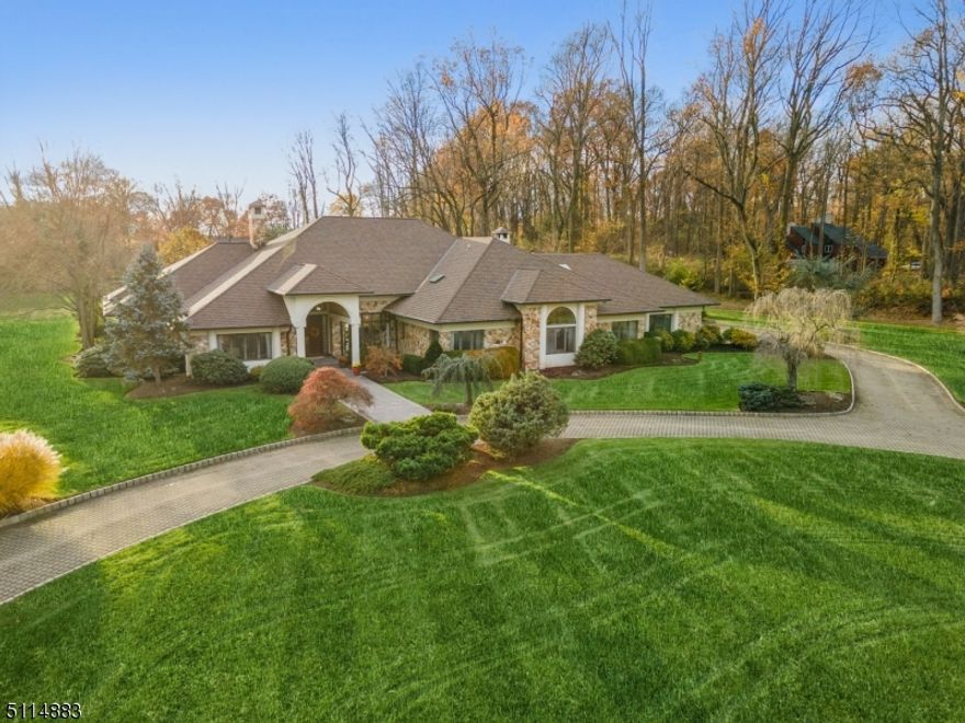 Stunning custom built home on a private cul-de-sac with 3.97 manicured acres in desirable New Vernon section of Harding.  Circular driveway with Belgian block curbing. Enjoy the spacious first level featuring an open floor plan with high ceilings, unique skylights, updated gourmet kitchen with high-end appliances, custom mill work and light filled dining area. Warm and bright family room features a wood burning fireplace, custom cabinetry and wet bar.  Elegant living room with gas fire place, formal dining room,  and warm library.  First floor primary bedroom , and 3 bedrooms each with en-suite baths complete the level.  Main level opens to large patio with built in grill,  in-ground heated pool with hot tub and picturesque lush landscaping and gazebo.  Upper level features a private bedroom with bath perfect for guests.   Finished lower level is an Entertainer's Dream with custom bar, catering kitchen, dance floor, expansive game room and gym.   Poured concrete and steel beam construction, newer HVAC and roof.  Less than 35 miles to Manhattan w easy access to nearby Morristown for entertainment,  train, shopping.