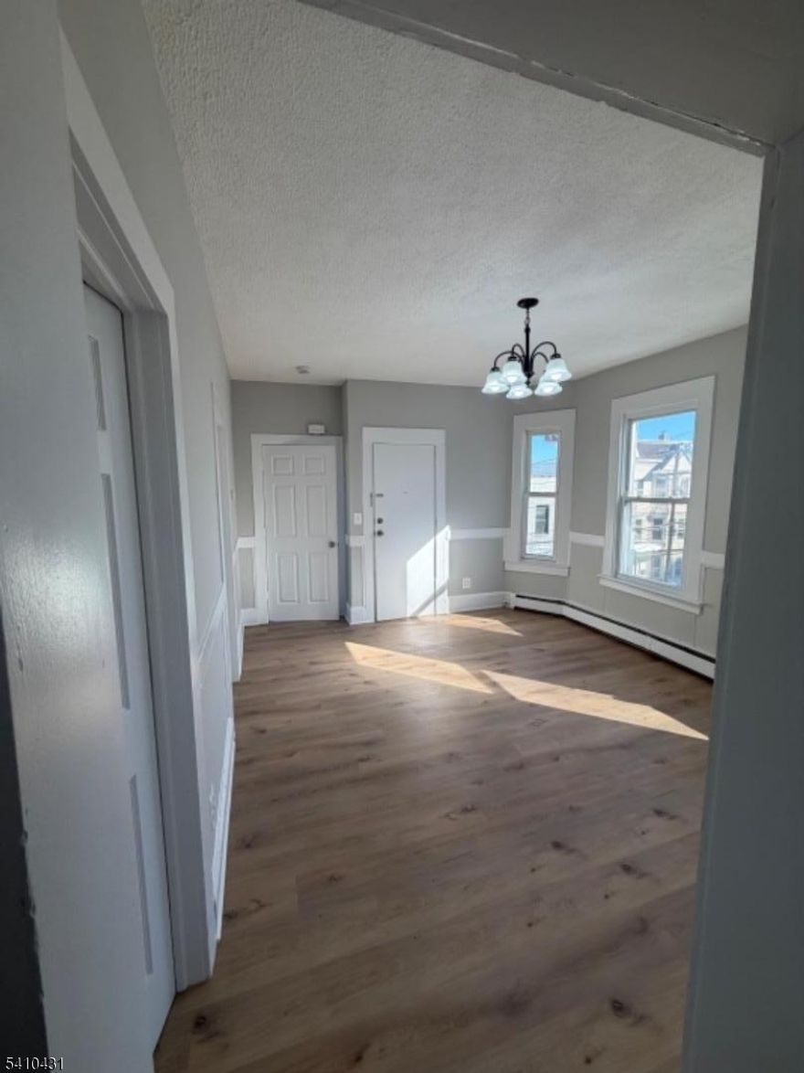 Welcome to this beautifully renovated 3-bedroom, 1-bath apartment offering modern finishes and a bright, open layout. Enjoy updated flooring throughout, a stylish kitchen with contemporary cabinetry, and a refreshed bathroom with sleek tile work. This home is spacious, sun-filled, and move-in ready. Pets are welcome with approval. Conveniently located near shopping, dining, schools, and public transportation.