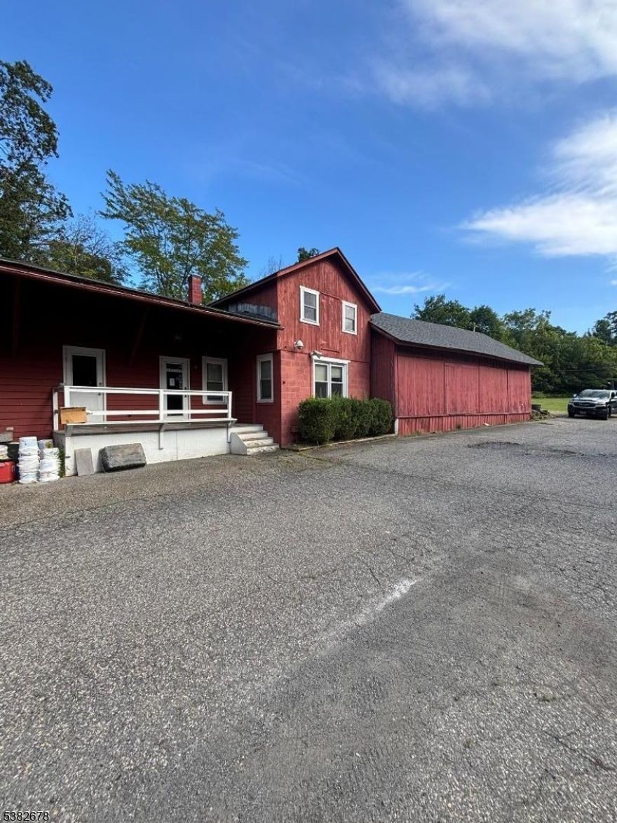 There are 4 buildings on 1.87 acres for a total of approximately 12 thousand sq. ft. This is an Industrial location which can be used for trucks, contractors etc...Also the second floor on the main building or over 3k Sq. Ft. it was used as office and it would make a perfect set-up for an Architect or large contractor's office. Plenty of parking space 10 minutes to Route 78. Gas propane heat-central air etc...Must see great set-up. Lots of parking. Historic Business Building. Reception, private offices, large work rooms, shipping and receiving, heated warehouse.