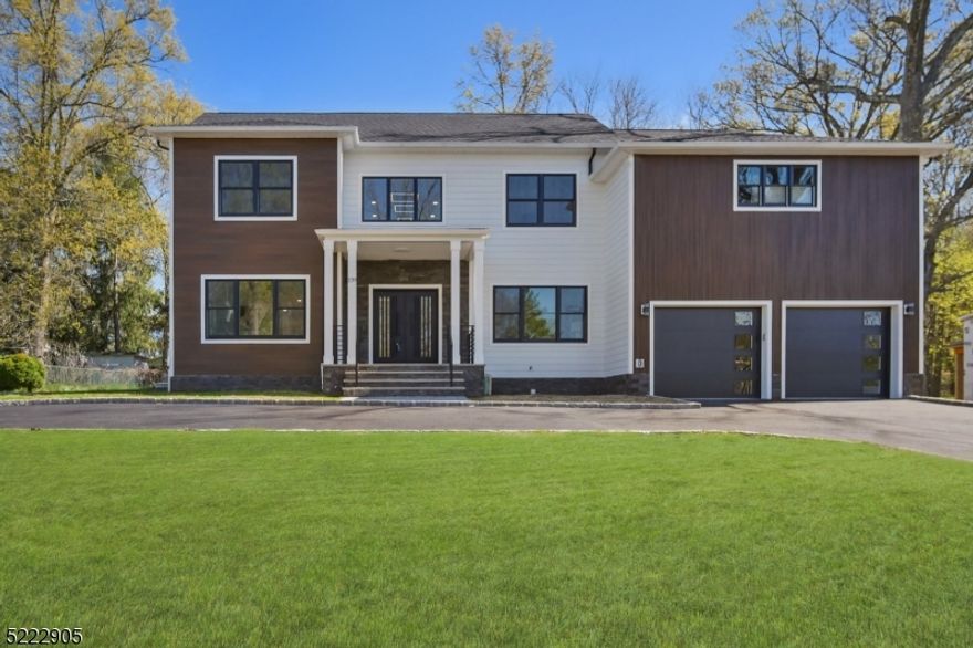 Stunning custom built 6BR/5.5BA colonial with 5000+ sq ft of living space set on 0.36 acre lot in the best location of the best town! This home boasts spacious open floor plan,1st floor in-law suite and office, Livingroom, family room and formal dining room, The kitchen is complete w high-end SS appliances, center island ,quartz counters, custom cabinets. The 2nd floor is home to 4 bedrooms, luxurious master suite , 2nd bedroom has its own en-suite, 3rd & 4th beds share a bath, laundry. Fully finished basement with 9' ft ceilings, Mud room, Media room, Rec room and Full bath.  Must See!!!