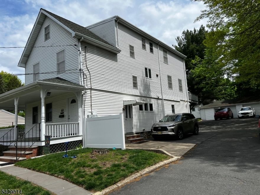 Beautifully updated three-bedroom ,1st floor apartment available in a prime Little Falls location. This spacious rental offers 3 bedrooms and 1.5 bathrooms, featuring an updated eat-in-kitchen with stainless steel appliances and quartz countertops. New flooring runs throughout the unit, and an in-unit laundry adds everyday convenience.Additional amenities include a nice front porch ,one-car garage, dedicated storage space, and two parking spots. Tenants also enjoy use of the yard.Ideally situated near Route 46, Willowbrook Mall, and offering easy access to NYC transportation, this home combines comfort, style, and convenience.
