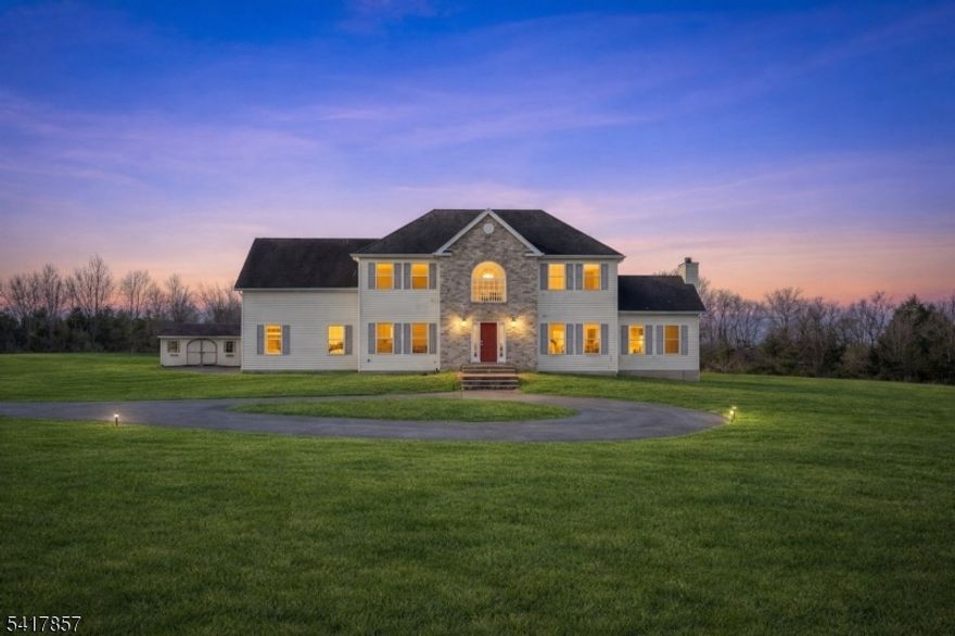 Welcome to this spacious and beautifully situated Colonial home nestled on a private 4.8-acre lot in desirable Washington Township. Possible subdivision (buyer to perform due diligence). This 5-bedroom, 3 full bath residence offers the perfect blend of privacy, space, and functionality.Built in 2001, the home features an airy layout ideal for both everyday living and entertaining. The main level offers generous living spaces, including a formal living room, dining room, bedroom, great room, and an eat-in kitchen with stainless steel appliances. Hardwood flooring runs throughout the first and second floors. Sliding doors off the kitchen lead to a large patio perfect for outdoor gatherings.Upstairs, you'll find four well-sized bedrooms, including a primary suite with a full bath. The home also includes a 2-car garage and a large, level lot providing endless possibilities for outdoor entertaining, recreation, or future enhancements.Located on a quiet cul-de-sac, this property offers a peaceful setting while remaining conveniently close to major routes, shopping, and local amenities.A rare opportunity to own a private, estate-style property with acreage in Warren County.