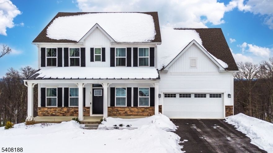 Skyline Views & Modern Serenity in Stone Water Village. Experience the perfect blend of style and scenery in this nearly-new Powell Model Colonial. Perfectly situated on a premium cul-de-sac lot, this home captures stunning valley views that set it apart from the rest. Highlights You'll Love:  The View: Private rear deck overlooking skyline vistas ideal for morning coffee or sunset dinners.  Sophisticated Interior: Sun-drenched open layout featuring a dramatic stone fireplace and a dedicated first-floor office.  Primary Retreat: Elegant suite with tray ceilings, dual walk-in closets, and modern finishes throughout.  Bonus Space: A finished walk-out basement offering endless flexibility for a gym, theater, or playroom. Located minutes from Lake Hopatcong recreation and major highways, this home offers the lifestyle upgrade you've been waiting for.