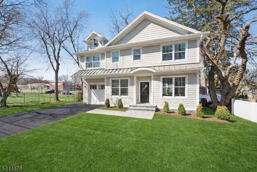 Fabulous new construction by a established local builder, offering 5 bedrooms and 4.5 baths in an unbeatable in-town location. Just moments to a charming downtown, the train, and top-rated Blue Ribbon schools, this home delivers the ultimate in convenience no car needed. Thoughtfully designed with today's lifestyle in mind, the first floor features a private office, mudroom, dining room, family room, kitchen with stainless steel appliances, and a powder room. White oak floors and timeless Pottery Barn-inspired finishes create warmth and sophistication throughout. The second level offers four bedrooms, three full baths, and a convenient laundry room. A walk-up third floor provides flexible space perfect for a playroom, or additional office. The finished lower level includes a fifth bedroom with full bath, a large recreation room, high ceilings, and a utility room. The exterior is outfitted with Hardie siding, Anderson windows, sod, underground sprinklers, belgian block curb and a spacious patio great for entertaining.