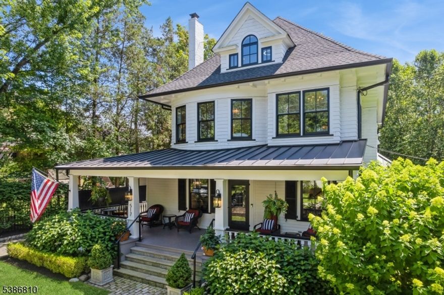 Discover an extraordinary opportunity in the heart of Westfield. This stunningly restored 1900 American Foursquare Colonial home is a rare gem that combines historical elegance with modern luxury on nearly an acre of custom-landscaped grounds, just blocks away from Westfield's vibrant downtown. Venture from your wrap-around porch to explore nearby shops & restaurants, or retreat to your expansively private backyard for the ultimate tranquility. The main house features five bedrooms, three full baths, and two half baths. The chic upscale kitchen is perfect for hosting gatherings. At the heart of the home, a conservatory flooded with natural light makes it easy to enjoy the outdoors from the inside. This distinctive family room is perfect for soaking in all four seasons, bringing a touch of nature into your everyday life. Adjacent to the main house is a carriage house dating back to 1890, rebuilt and restored in 2022. This versatile space includes a private patio, a bonus room ideal for a home gym, and a two-car garage with EV chargers. The media room on the second floor has vaulted ceilings, a wet bar, and a full bathroom. Lastly, a standout feature of this property is the decommissioned private tennis court. As one of only four homes in Westfield with this feature, the court holds endless potential - whether restored to its former glory, converted into a pickleball court, or transformed into a pool. This exquisite property is a rare find. Come see for yourself.