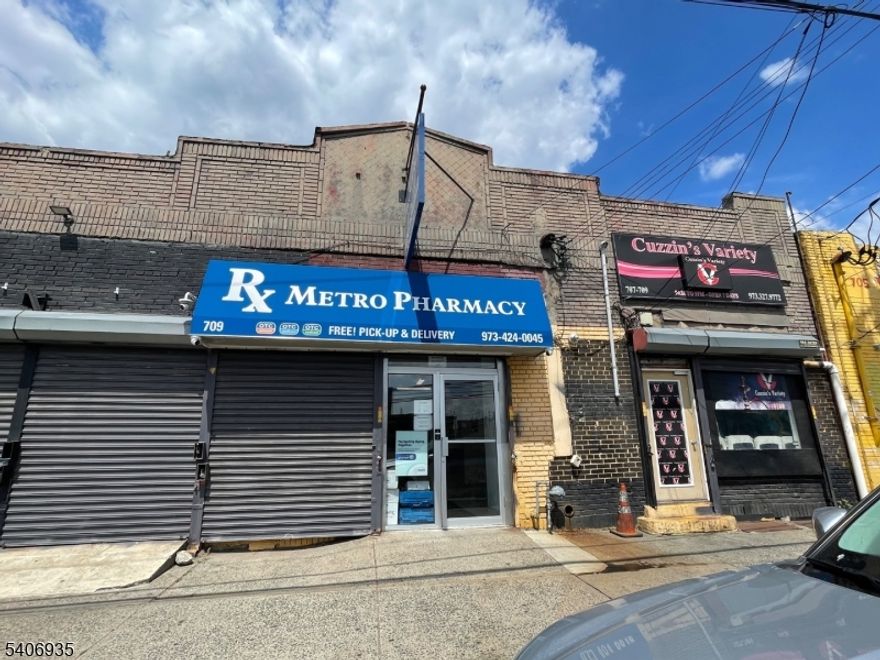 Exceptional commercial opportunity in Newark, ideally located adjacent to the brand new Lions Gate development. This versatile property features three street-level commercial storefronts along high-traffic Frelinghuysen Avenue, offering excellent visibility and consistent foot traffic. In addition, the building includes two warehouse spaces with access from Foster Street, providing flexible options for storage, distribution, or light industrial use. Situated in a prime, rapidly developing area, this property presents tremendous upside potential for investors, owner-users, or redevelopment. A rare chance to acquire a multi-use asset in one of Newark?s most promising growth corridors.