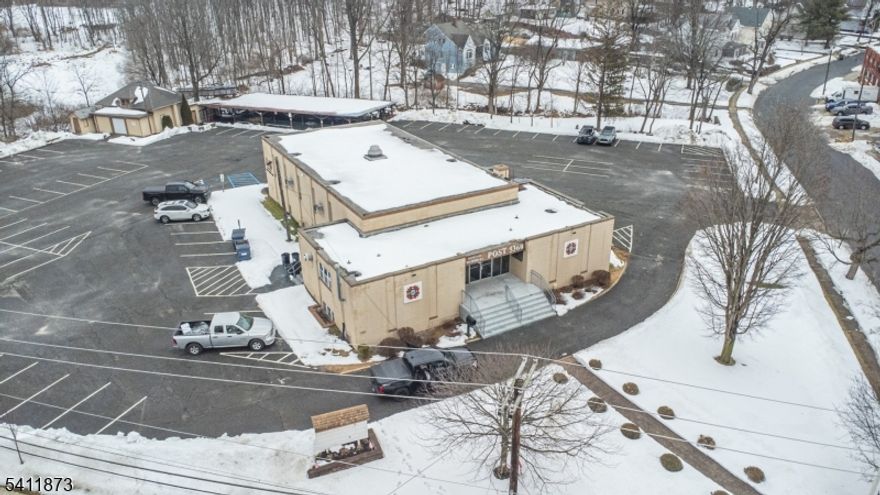 Current Home Of The Newton VFW is Now Available! This Unique Opportunity to Purchase This 1.8 Acre Lot in a T-4 Zone Has Many Mixed-Use Purposes With 100 Parking Spots & Multiple Out Buildings This Property Is One That Will Amaze an Investor Or Developer!