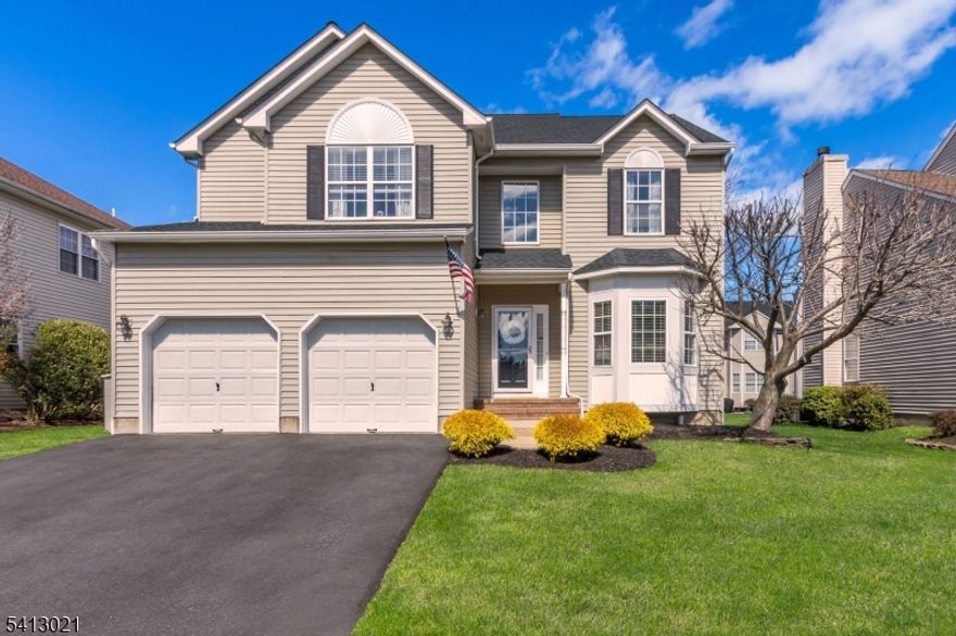 Welcome to this beautifully maintained four-bedroom, two-and-a-half-bath home in desirable Bridgewater. Proudly offered by its original owners and available for the first time, this bright and sunny home features freshly painted interiors and a spacious layout ideal for everyday living and entertaining. The first floor offers a welcoming living room, formal dining room, eat-in kitchen, and a stunning two-story family room filled with natural light and centered around a wood-burning fireplace. A first-floor laundry room and powder room add convenience. Upstairs, four generously sized bedrooms include an owner's suite with new carpeting, fresh paint, and an updated en-suite bath featuring a new vanity, faucet, lighting (2026), refreshed tile, and updated flooring, along with an updated main bathroom. Recent updates include roof and water heater (2023), laminate flooring (2023), washer and dryer (2023), dishwasher (2024), driveway (2024), new carpeting on stairs and second-level hallway (2026), interior paint (2026), and freshly stained deck (2025). Exterior has been power-washed, with shutters and front door painted. Full basement offers potential for additional living space. Landscaped backyard with deck, patio, and underground sprinkler system. Fireplace and sprinkler system conveyed as-is with no known issues. Sellers are providing a one-year home warranty for added peace of mind. Convenient to shopping, dining, parks, commuter routes, and top-rated Bridgewater schools.