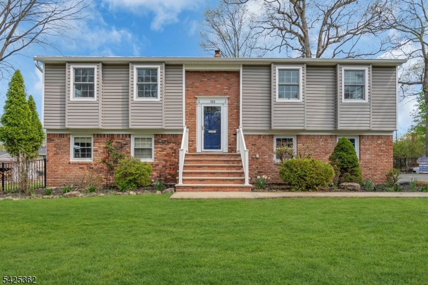 Welcome to this lovely & spacious bi-level home offering comfort, flexibility, and incredible potential in the heart of Packanack Lake.The main level features 3 bedrooms and 2 full bathrooms, including a primary suite with its own private bath. A bright & inviting living room flows into the formal dining room, which opens to the kitchen complete with granite countertops &stainless steel appliances perfect for everyday living &e ntertaining. Hardwood floors run throughout the main level, offering a great opportunity to refinish & customize to your personal style.The walkout lower level provides additional living space with a large family room & a custom bar area, ideal for gatherings or relaxing at home. Originally designed as a four-bedroom home, the fourth bedroom was opened up to enhance the space but can easily be converted back if desired. This level also includes a powder room & direct access to the two-car garage, which features a unique bonus a sauna for your own private retreat.Step outside to a spacious, level, fenced-in backyard perfect for outdoor enjoyment, entertaining, or simply unwinding.Enjoy all that the Packanack Lake lifestyle has to offer, including optional membership with access to two beaches, boating, fishing, kayaking, sailing, iceskating, pickle ball, adult kickball, youth athletics, seasonal events, and a true sense of community. Conveniently located near parks, shopping, dining, and major commuting routes.