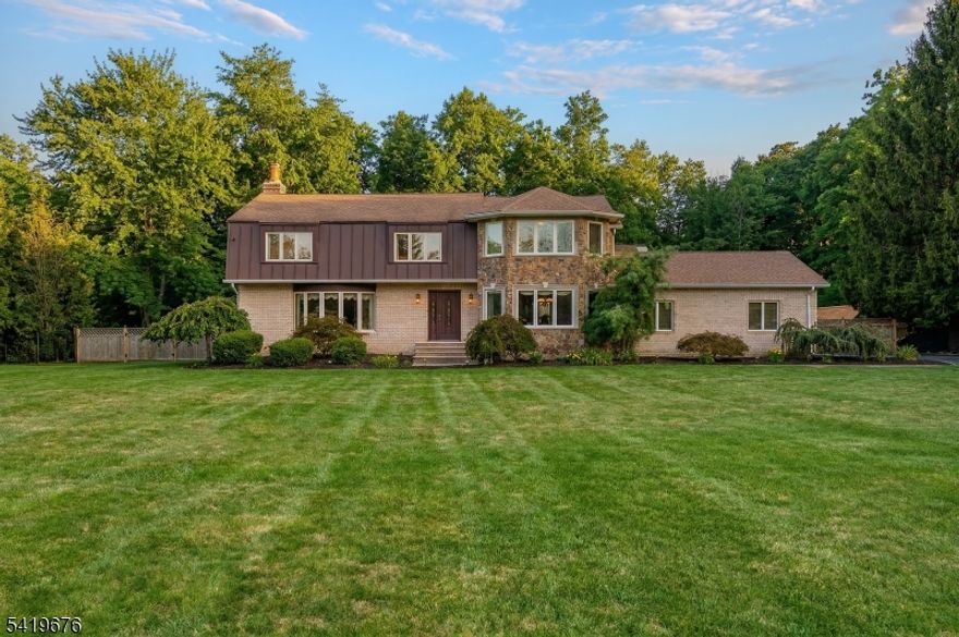 Welcome to 262 Skyline Drive, a beautifully maintained, spacious home set on over an acre in the desirable Skyline Ridge neighborhood in the Millington section of Long Hill Township. Backing directly to a national wildlife refuge, this property offers exceptional privacy and tranquility with protected natural views creating a truly serene and exclusive setting. With over 3,300 sq ft of above-grade living space, the home blends timeless design with everyday functionality in a peaceful, private environment. A welcoming foyer leads to generously sized living and dining rooms, ideal for both daily living and elegant entertaining. The kitchen features ample cabinetry and a bright breakfast area. The expansive family room includes a stone fireplace and glass doors to the backyard oasis and is perfect for gatherings and relaxed living. A first-floor office or meditation room, powder room, laundry area, and mudroom add comfort and flexibility. Upstairs, the spacious primary suite offers impressive scale, multiple closets, dressing room and a private bath. Three additional bright and large bedrooms and a full hall bath complete the level. The basement includes a large recreation room ideal for a home theater, gym, or playroom, along with abundant storage. Enjoy peaceful surroundings just moments from parks, top-rated schools, and commuter routes an exceptional opportunity in one of Morris County's most sought-after neighborhoods.