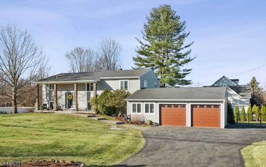 Beautifully updated and meticulously maintained, this charming Bi-Level home offers versatile living space and timeless appeal. Featuring 4 Bed, 3bath, hardwood floors, an attached 2-car garage, and a storage shed, the home is perfectly positioned on an oversized corner lot in a desirable Morris County community. A stylish double staircase leads to the main level where an open floor plan connects the living room, dining area, and a spacious kitchen appointed with two-tone cabinetry, corian countertops, and SS appliances. The bedroom wing includes a generous primary suite w/spacious closet and private en-suite bath, 2 additional bedrooms, and a hall bathroom. The LL features a bright recreation room with sliding glass doors to the backyard patio, a private office, and a laundry room. Additional living space includes a comfortable in-law or guest suite complete with kitchenette, living room, bedroom, full bath, and private entrance. Completing the home is a beautiful stone paver patio with pergola overlooking a sweeping fully fenced backyard framed by mature trees, offering privacy perfect for outdoor dining, entertaining, or relaxing evenings. Ideally located in Randolph just minutes from vibrant downtown Morristown, offering renowned dining, boutique shopping, and cultural attractions. Commuters enjoy convenient access to nearby NJ Transit stations with direct service to NYC, while Randolph is celebrated for its top-rated schools, scenic parks, and extensive trail systems.