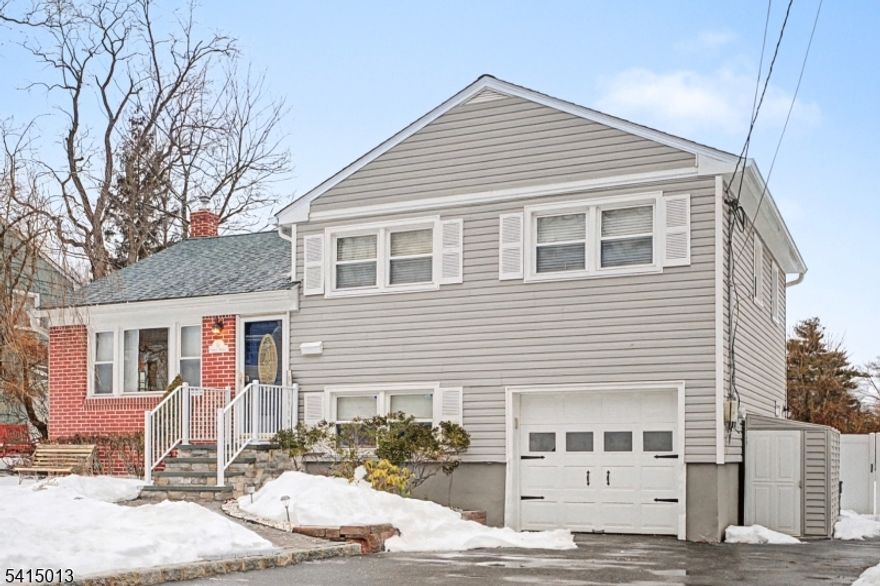 Beautifully maintained 3-bedroom, 1.5-bath split-level home located on a quiet dead-end street in the desirable Redwood section. Features include hardwood flooring, spacious rooms, and a modern kitchen that opens to the dining area with sliders leading to a large deck overlooking the fenced-in backyard perfect for entertaining. The ground level offers a half bath and a flex room ideal for a home office, guest room, or den, plus a finished basement with rec room and laundry area. Major updates include a newer roof, furnace, and upgraded electrical. Ample closets and storage throughout. Fantastic location close to shopping, parks, and major commuters delight with the jitney shuttle to NJ transit just at the corner!!