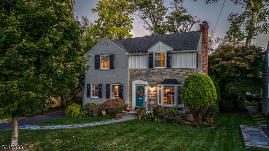 CLASSIC COLONIAL CHARM IN PRIME SHORT HILLS NEIGHBORHOOD! Set in the sought-after Glenwood section, this divine 3-bedroom, 1.1-bath center-hall layout is rich with character and comfort. Hardwood floors and abundant natural light flow throughout the First Level, starting with welcoming Entry Foyer, complete with coat closet. Formal Dining Room features dentil crown and chair rail molding, perfect for memorable meals and joyous events; while elegant Living Room offers attractive built-in shelving and cabinetry for style and function. Gather together in the sun-filled Family Room, enveloped in windows; and embrace the living space that also opens to an elevated deck for effortless indoor-outdoor entertaining occasions. Well-appointed Eat-In Kitchen fancies cozy dining nook, granite countertops, decorative tile backsplash, and stainless steel appliances; as well as access to back deck for easy grilling. A convenient Powder Room completes First Level. Upstairs, three bright bedrooms provide comfortable retreats, plus a lovely Full Hall Bathroom with granite vanity, tub, and separate shower. Primary Bedroom boasts 2 closets, including a generous walk-in. Unfinished Third Level attic, accessible through Primary closet, offers future potential. Lower Level adds versatility with finished Rec/Exercise room, Laundry Room, and a large utility/storage area. Fenced-in Backyard is ideal for play, pets, and good times. GREAT location, close to Downtown, schools, shopping, and so much more!