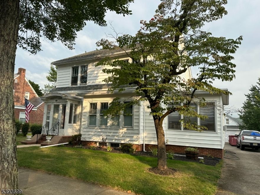 Vintage Dutch Colonial in Good condition...Original Charm with Wide Wood Trim, Glass Door Knobs, Built-In French Glass Door Dining Room Cabinet...Original Glass French Doors separates Dining Room and Living Room with Decorative Non-Working Fireplace... Kitchen with Built-In Wall Storage Cabinets...Hard Wood Flooring...Glazed 3 Season Sunroom...