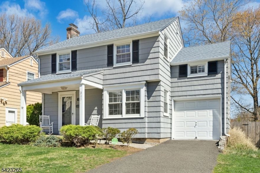 This home is ready for its new owners! This charming colonial in this fantastic quaint neighborhood in the heart of Fanwood is roughly 1/2 a mile to the Fanwood downtown and train station, and in the sought-after McGinn Elementary School district. The first floor is light and bright and offers convenience for every day living. The kitchen opens to the back deck overlooking the expansive fully fenced backyard. Upstairs, three very generously sized bedrooms offer plenty of space, with a hall bathroom. The basement level is finished with rec space, a half bathroom for added convenience, plenty of storage, as well as laundry space.