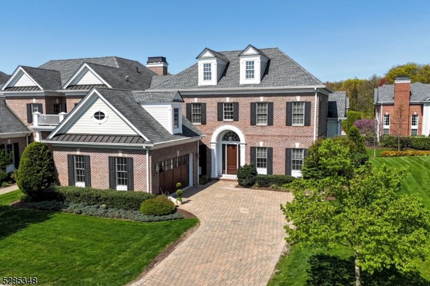 A LUXURIOUS JAMESTOWN II MODEL WITH 3 BEDROOM AND 4.5 BATHS. OPEN FLOOR PLAN WITH BEAUTIFUL CROWN MOULDINGS, WAINSCOTTING AND HARDWOOD FLOORS THROUGHOUT THE FIRST FLOOR GREAT ROOM WITH MARBLE FIREPLACE, FORMAL DINING RM. A CHEF'S DREAM KITCHEN WITH TOP-OF-THE-LINE APPLIANCES, CENTER ISLAND, GRANITE COUNTERS,PANTRY AND DINING AREA OVERLOOKING THE GROUNDS. LUXURIOUS FIRST FLOOR PRIMARY SUITE WITH HIS AND HER CLOSETS. MAGNIFICENT MASTER BATH. SECOND FL. FEATURES 2 BEDROOMS AND 2 FULL BATHS & LOFT. FINISHED LOWER LEVEL WITH KITCHENETTE, BATH, UTILITY ROOM AND AMPLE STORAGE. GENERATOR HOOK-UP AND SOUND SYSTEM. AMENITIES INCLUDE GATED COMMUNITY, CLUBHOUSE AND POOL, LANDSCAPING, EXTERIOR MAINTENANCE, SNOW AND GARBAGE REMOVAL. LUXURY LIVING AT ITS BEST!