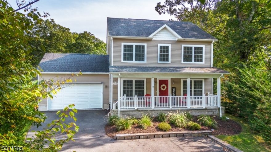 Absolutely lovely 3 bedroom, 2 and half bath Colonial with an inviting open porch, formal dining room, breakfast bar, plenty of kitchen cabinets, stainless steel appliances, large master suite with master bath & Jacuzzi, nice size bedrooms, office/den, newer windows, new patio for those great barbecues, new fence-ideal to keep those fur babies corralled, nicely decorated with charm and attractive light colors, recessed lighting, immaculate, plenty of parking to accommodate 8 cars, 1,856 square feet of living space, beautifully landscaped with adult trees & shrubs, amazing neighborhood with great neighbors, massive backyard for entertaining a football game or swimming pool, low taxes, two car garage. In addition, a full house water filtration system, water softener & Generator Hook-up. Air Conditioning & Furnace are High Efficiency.  Statements available.  JUST PERFECT!  Do not miss out on this one. You won't be disappointed.