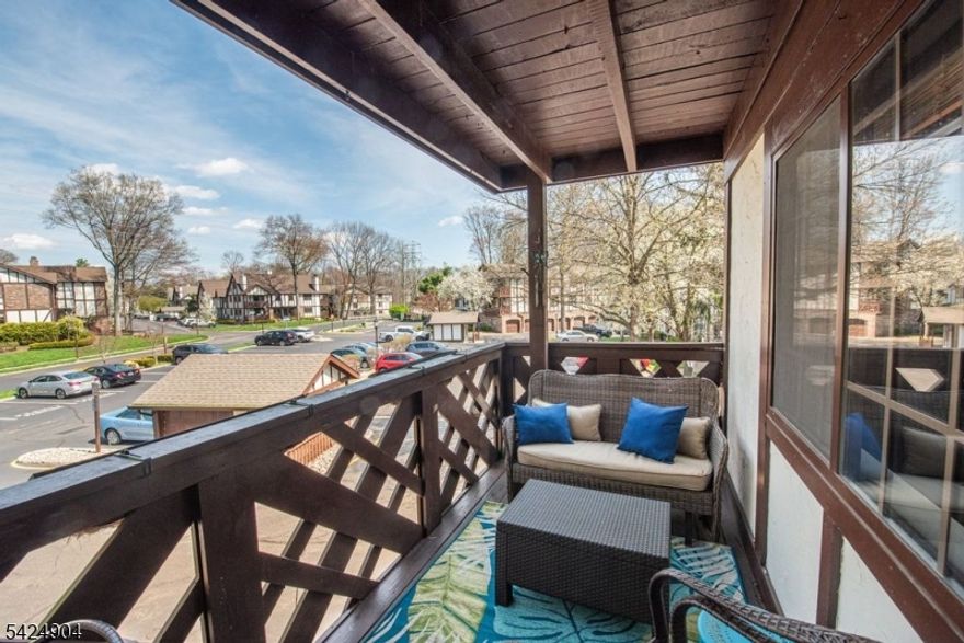 Rare and one of the Largest 1 bedroom models in Ridge Gardens,, this updated unit boasts Gleaming hardwood floors which greet you as you enter the foyer to the living room and formal dining room which is open to the kitchen. This sunny condo boasts an updated kitchen with stone countertops, SS appliances and breakfast bar for casual dining.  Commune with your guests as you prepare a gourmet meal. King size bedroom boasts walk in closet. Updated full bath with walk-in shower is warm and cozy. Full size washer & dryer with storage. Private balcony for outdoor living completes this beauty. Caged and locked storage in the building. Ridge Gardens is like being in the English countryside. Paver walkways to meet your neighbors as you walk, jog, bike or take your dog out for exercise. Refreshing pool for summer fun, tennis and picklelball courts for the sports enthusiast. NYC bus stop just outside the entrance. Close to schools, library, shopping and transportation. A fabulous lifestyle.