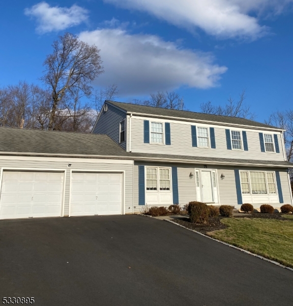 This Fabulous, Traditional Center Hall Colonial is located in a highly sought after neighborhood and is ready for its new owners! Features include an inviting entrance foyer, formal dining room, bright, sun splashed living room, charming kitchen overlooking picturesque yard, and a wonderful family room with fireplace. Hardwood floors, which are beneath the carpets (except in family room and kitchen) add to the home's allure. There are 4 spacious bedrooms with a wall previously removed between two of them, which could easily be restored for a true 4 bedroom layout. The home also includes 2.1 baths and a partially finished large basement. A two-car garage, conveniently located off the kitchen, along with a first-floor laundry room adds to the convenience of this home. The parklike yard offers plenty of outdoor space for relaxation and entertaining. With easy access to major highways, NYC transit, shopping, and dining options, this property is ideally located. This home is full of potential with an open palette for buyers to transform into their dream home! Make it yours!!! Pictures and video coming soon.