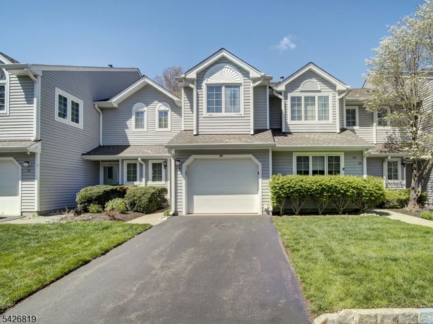 This two-bedroom Aberdeen model townhome is located in the premier community of Montville Chase, offering an exceptional lifestyle with a wide range of amenities, including a renovated pool, tennis courts, pickleball courts, jogging track, and clubhouse. The thoughtfully designed floor plan is ideal for both everyday living and entertaining. The home features neutral decor and laminate flooring throughout the first floor, along with an inviting entry foyer complete with a coat closet and powder room.The eat-in kitchen includes a breakfast bar, granite countertops, gas range/oven, microwave, dishwasher, and ample cabinet space. The dining room flows seamlessly into the living room, highlighted by a cozy wood-burning fireplace and sliding doors that open to a Trex deck overlooking a serene, park-like backyard. The spacious primary suite offers a private bath with a Roman soaking tub, separate stall shower, double vanity, and a walk-in closet. A well-appointed guest suite also includes its own full bath and walk-in closet. Additional features include a second-floor laundry room, generous closet space throughout, and an attached one-car garage with an automatic door opener. Conveniently located near top-rated schools, shopping, parks, major highways(287, 80,46 & 280), and NYC transportation. With a few personal updates, this home presents an incredible opportunity to create the space you've always envisioned. Don't miss your chance to make this wonderful property your new home!