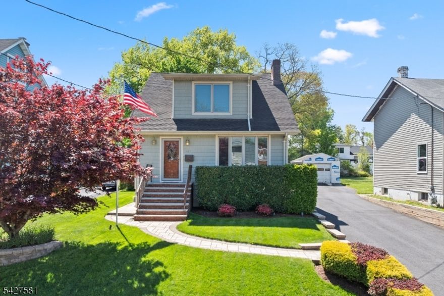 Welcome home to this immaculately kept gem located in Garwood Borough, Union County. This beautifully renovated home features inviting landscaping, tastefully finished interior with hardwood floors, wood burning fireplace, and finished basement (with flex room or potential third bedroom). Additional upgrades include an updated deck (stained 2026) complete with sunset awning, recently repaved driveway (with concrete top pad), stone walkway, updated kitchen (granite countertops, custom cabinets, five burner range), backup generator, outside security cameras (included), and irrigation / sprinkler system. The finished basement is accessible from a separate entrance and features a full bathroom, flex room (office / third bedroom), and partial kitchen. Enjoy summer nights in the inviting backyard complete with the recently added hot tub and tiki bar. Tucked away in a cozy neighborhood, it is conveniently located to local shopping, Interstates (GSP and NJ Turnpike), and public transportation (NJ Transit train station). Furniture items in the home are available as well, please inquire for more information and additional home features!