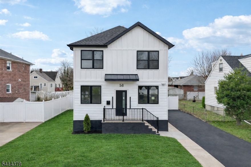 Newly built north-facing home with 9-foot ceilings, a first-floor bedroom and full bath, and approximately 5 minutes to NJ Transit with direct NYC routes. The main level opens into a bright living area that flows seamlessly into the dining space and contemporary kitchen, finished with quartz countertops, stainless steel appliances, custom cabinetry, and a center island designed for everyday use and entertaining. A standout feature is the first-floor bedroom, full bathroom, and private office, offering exceptional flexibility for guests, remote work, or additional living needs. Upstairs, spacious bedrooms include a primary suite with a walk-in closet and en-suite bath. An additional full bathroom serves the remaining bedrooms, and an upstairs laundry room adds everyday convenience. The basement offers substantial storage space and future potential. Outdoor living includes a deck and backyard area. Built with all-new systems and modern finishes throughout, and conveniently located near major highways, shopping, parks, and local amenities.    A thoughtfully designed home that balances flexibility, modern comfort, and long-term value.