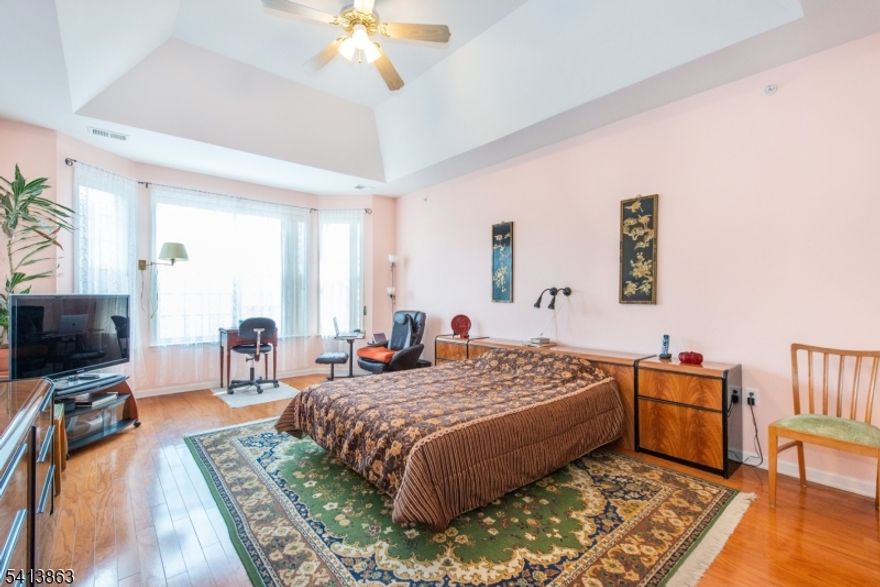 Highly desired Magnolia in this premier 55+ community. Open airy one level unit, large kitchen with many cabinets and pantry, separate eating area. Living room, dining room, spacious den, laundry room. The kitchen has custom cabinets & granite countertops. There is a one car attached garage. Primary master bedroom has walk in closet, full bath with duel sinks, stall shower. Hardwood floors throughout. The second bedroom and bathroom offer privacy between rooms. The den area is perfect office with windows. There is a private balcony from living room. The gas fireplace in living room adds to the cozy atmosphere. This light and airy unit has many exits. Close to major highways and restaurants. Shopping minutes away. The club house provides an active lifestyle with activities for all. The The indoor and outdoor pool, tennis, pickle ball, exercise facilities are just adding to this wonderful lifestyle.