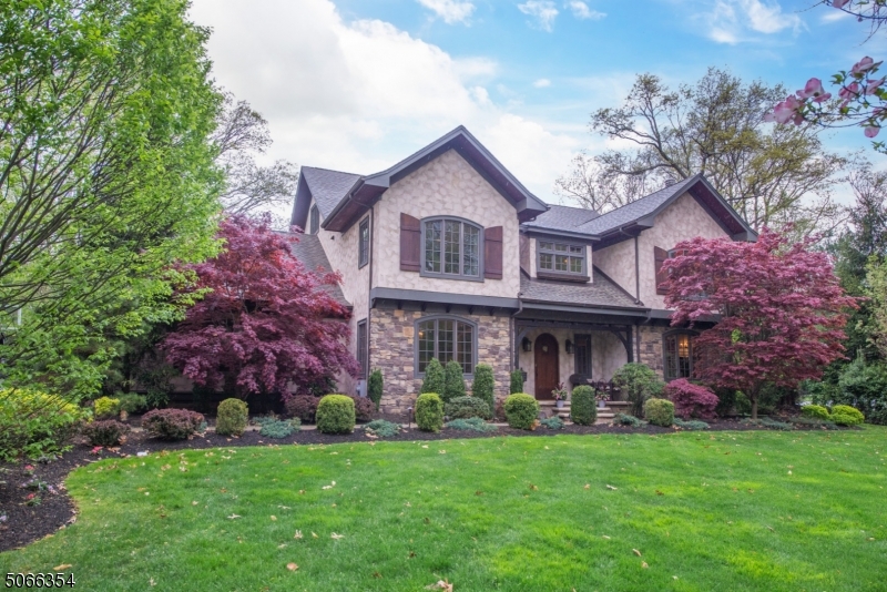 Elegance and grace abound in this custom colonial set on an impeccably landscaped .63 acre, level lot. With all high-end finishes and exquisite architectural details, this home will steal your heart! From the stunning 42 ft. great room w/stone fireplace to the fabulous, gourmet kitchen, expansive master suite w/private balcony & ideal exercise studio, this gem has all the bells & whistles imaginable. Outdoor entertaining will be a pleasure w/a charming covered back porch overlooking the meticulously landscaped property featuring a fabulous stone patio w/built in fire pit & bench seating! A truly unique home w/incredible features ie: hardwood floors, archways, custom trim work, built-in cabinetry, beautiful window treatments, & more. This is the one you have been waiting for. Just move in and you have arrived!
