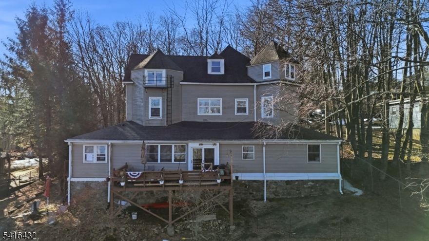 Charming, income-producing multi-family just steps from Lake Hopatcong a rare value-add opportunity in a highly desirable lake community offering stunning views. This 4-unit property (with potential for a legal 5th unit, subject to municipal approvals) sits on nearly a full acre and currently generates approximately $92,000 annually, reflecting an attractive 7.1% cap rate with low operating expenses. Each unit is separately metered and equipped with newer tankless water heating systems, helping to minimize owner expenses. Recent exterior improvements include a newly paved driveway and retaining wall. With light interior renovations, three units present immediate rent growth potential. Located within walking distance to the public beach and close to the marina, shopping, and dining, the property offers strong long-term rental appeal and consistent tenant demand. Financials and detailed unit breakdown available upon request.