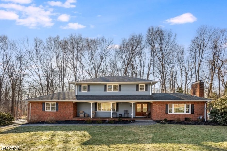 Beautifully Updated 4-Bedroom Colonial with Resort-Style Backyard. This stunning 4-bedroom, 2.5-bath Colonial has been completely updated. At the heart of the home is a truly one-of-a-kind Kitchen, exceptional in both size and design. Featuring a large center island, an impressive 5-person breakfast bar, abundant cabinetry, and custom built-ins, this space is ideal for cooking, gathering, and entertaining. The kitchen flows seamlessly into the dining room, creating an expansive open-concept layout. Hardwood flooring runs throughout the home, while large windows fill each room with beautiful natural light. Step down into the inviting living room, highlighted by a Vaulted Ceiling, built-ins flanking the wood-burning fireplace & sliders that open to the back deck. A cozy Den also features French doors leading to the deck. The backyard is truly a private retreat. A two-tier deck overlooks a paver patio surrounding the in-ground pool and leads to a dedicated fire pit area. The tree-lined yard offers a peaceful and private setting. The finished basement offers incredible additional living space, including a large family room, office/exercise room, walk-in closet, and a unique hidden playhouse tucked beneath the stairs. Major updates within the past 1-10 yrs include: Roof, Furnace, Central Air, Kitchen, Bathrooms, Pool Liner & Heater. Recently installed crown & base molding add another level of detail & craftsmanship throughout. All Public Utilities.