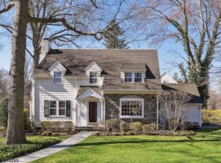 Nestled in one of Summit's most desirable neighborhoods, this 5 bedroom 3.1 bath home is a true gem that has been meticulously maintained and updated to perfection.   This Center Hall Colonial is filled with so much natural light; it is bright, airy and so spacious.  The centerpiece of this home is the Heidi Piron designer kitchen.  This highly functional kitchen with its custom cabinetry, Honed Marble countertops, oversized Wolf range, individual Sub Zero Refrigerator and Freezer is one of a kind ....  Beautiful hardwood floors throughout, custom millwork, pocket doors and built ins are some of the main features of this move in ready charmer.  The second floor hosts 4 generous sized bedrooms with both a main hall bath and primary bathroom.  The bonus third floor is an additional bedroom with its own en-suite bathroom.  Fabulous finished basement with large laundry room and plenty of storage.  Close to town, Memorial Field, schools and all Summit has to offer.