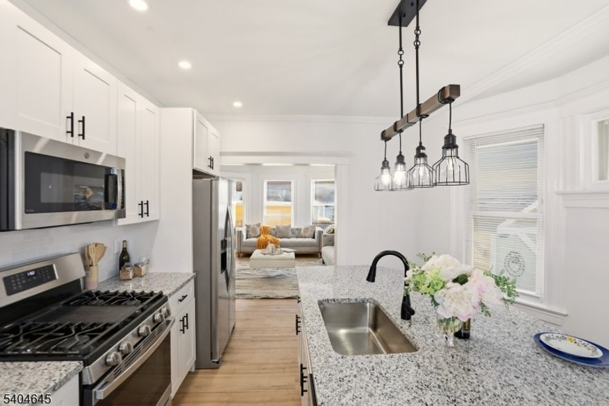 Renovated Spacious 5-bedroom, 1.5-bath home ideally located just steps from the Glen Ridge border.  This property offers a large, sun-filled living room, a separate dining room, and generously sized bedrooms providing flexible living options.The Brand New Kitchen Features an expansive island and stainless steel appliancesThe full basement features an unfinished half bath, Laundry hookups, and expansive open space?perfect for storage or future customization. With solid layout, abundant square footage, and endless potential, this home is ideal for buyers looking for space, beauty, and options. Conveniently located near transportation, shopping, schools, and major commuter routes.A rare opportunity in a sought-after location?come make it your home.