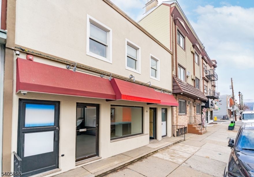 Commercial space available in a great location. Ground floor unit with approx. 2800 sq.ft. Currently set up with reception / waiting area, four private rooms, large office in the back, and two restrooms. Central heat and AC. Available for immediate occupancy.