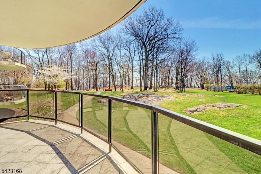 Welcome to this beautifully appointed 2-bedroom, 2-bath residence offering over 1,700 square feet of refined living space, where timeless elegance and comfort come together beautifully. Graciously proportioned rooms, a warm sophisticated ambiance, and thoughtfully designed interiors create a home that is both inviting and impressive. The kitchen is tastefully designed with custom cabinetry, quality finishes, and an efficient layout that blends everyday function with understated style. Expansive living and dining areas are enhanced by elegant custom built-ins and open seamlessly to a private balcony overlooking the pool area, manicured lawns, and mature trees, creating a peaceful and relaxing setting. The spacious primary suite offers a true retreat, featuring generous proportions, abundant closet space, and a beautifully appointed en-suite bath. With its lovely views, timeless appeal, and exceptional sense of space, this residence offers luxury living in a tranquil setting. Amenities Include:24-hour concierge, on-site maintenance, and valet parking services, library, a residents' lounge/party room,  a fitness center with separate men's and women's saunas,  an Olympic-size pool with expansive outdoor deck,  picnic and grilling areas, . tennis, multiple purpose courts, putting green all set amid beautifully manicured grounds, areas, all set amid beautifully manicured grounds.