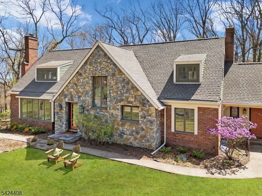 Welcome to this beautifully designed custom Colonial set on 20 picturesque acres, offering a seamless blend of comfort and functionality. The open floor plan creates inviting spaces ideal for everyday living and entertaining, while hardwood floors throughout much of the home add warmth & appeal. Highlights of this spacious layout include a private guest suite above the mud room and a first floor office adjacent to a full bath - perfect as a flexible space or potential additional bedroom. The second floor primary suite is filled with natural light from surrounding windows & features abundant closet space, along with an ensuite bath that includes a second vanity and dressing area. The full, unfinished walk-out lower level provides endless possibilities for customization, whether for additional living space, a home gym, or recreation area. Recent updates include a new roof, skylights, gutter guards, a water treatment system with oversized well pump, dog fencing around the backyard just to name a few. The 10-stall barn was extensively renovated in 2025 with new Hardie siding, trim, windows, exterior and stall doors &  gutters. Amenities include a heated wash stall, large grooming bay, utility room with washer and dryer, heated wood-paneled tack room, feed room, and an office with kitchenette and newer full bath. The property also features large fenced turnout pastures and expansive hayfields, plus direct access to the Tewksbury Trail System. Ideal for any equestrian discipline.