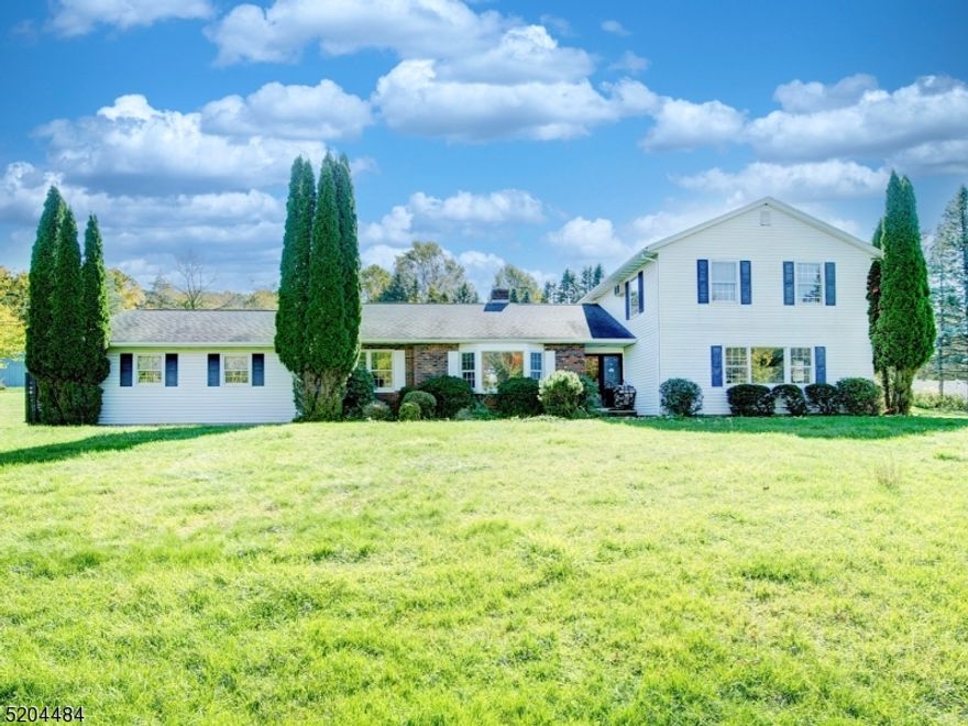 THIS HOME IS SITUATED ON 1.77 PARK-LIKE, PRIVATE ACRES. IT HAS  5 BEDROOMS, 3 FULL BATHS.  HOME IS VERY SPACIOUS. IT HAS A PRIVATE, FIRST FLOOR GUEST SUITE WITH TWO BEDROOMS, FULL BATH,  SUMMER KITCHEN WITH ACCESS TO SIDE YARD.  THE ROOF IS APPROXIMATELY 12 YEARS OLD. THIS IS AN ESTATE SALE AND IS STRICTLY BEING SOLD AS IS. THIS COMMUTER-FRIENDLY HOME LOCATED IS VERY CONVENIENTLY LOCATED CLOSE TO ROUTE 206, STORES, RESTAURANTS, SCHOOLS & PARKS. PRICED TO SELL!