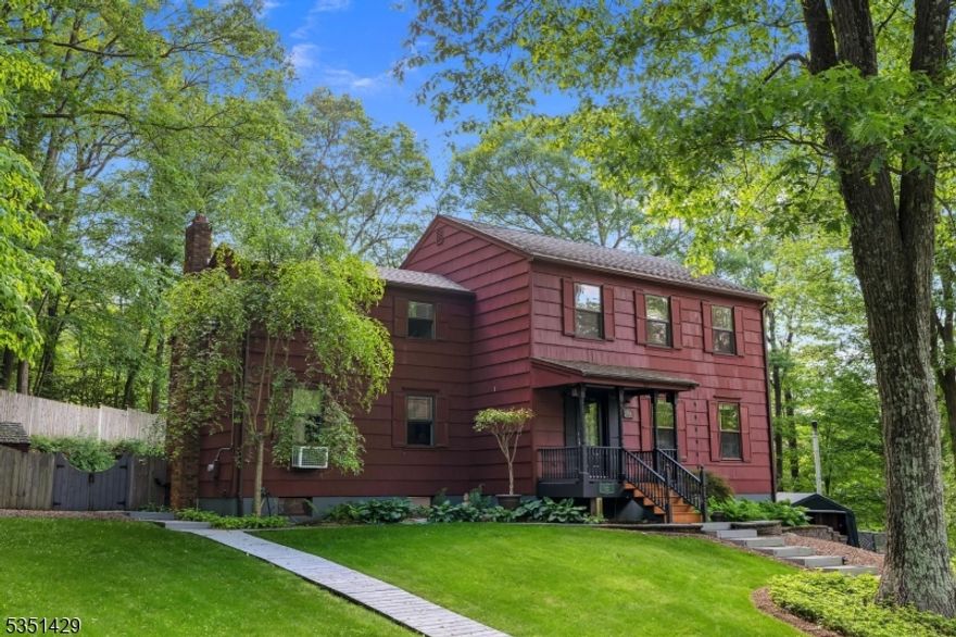 Colonial with 3 acres of privacy has charm and character - wood exterior, extensive decking and gazebo for entertaining in the fully fenced rear yard. Pella windows, flex fuel heating with wood or oil, detached barn/workshop. Four spacious bedrooms, two full and 1 half bathrooms, hardwood flooring, eat-in kitchen with granite counter tops and bay window overlooking beautiful, lush green backyard, family room with built-in entertainment system with surround sound, solid core interior wood doors, huge formal dining room and large basement.  Hackettstown 07840 mailing address; cooking station with grill remains. TVs remain; sale contingent upon Sellers finding suitable housing. Unusable pot belly ornamental stove can be removed upon request.