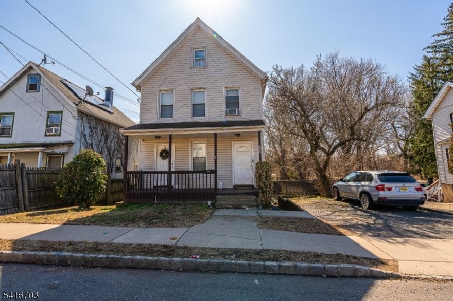 Two-family house set on a beautiful 4.22-acre property. The first-floor unit (left side) features 2 bedrooms, 1 full bathroom, living room, laundry nook, and an eat-in kitchen with access to a deck overlooking the backyard. The second-floor unit (right side) offers 3 bedrooms, a finished walk-up attic, 1 full bathroom, laundry nook, and an eat-in kitchen. Unfinished basement and separate utilities. Ample parking located behind the house. An outbuilding on the property, formerly a milk house, is currently used for storage.   Both units are currently rented, with both tenants on month-to-month leases. The property will be conveyed with tenants in place; seller will not deliver the property vacant at closing. As per Bound Brook's Zoning Map, the house is in zone R-4 and the property is in zone OS-C.  Waiting on confirmation from the Zoning Department. Subdivision might not be possible.  Buyers are to conduct their own due diligence before submitting an offer.