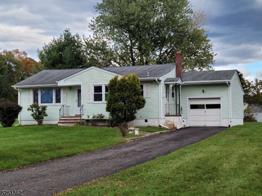 Property, Accessibility, Opportunity all describe this 3 Bedroom Ranch located near the end of the Park Lane cul-de-sac. This home is situated on just shy of 1 Acre of Land and the lot is open and level (great for all of those outdoor activities) and yet is minutes away from major roads such as Route 22, 31 and Route 78. This ranch style home also offers an opportunity to grow and expand with additional living space and yet, as it is, offers 3 bedrooms, all with hardwood flooring. The mostly finished basement adds to the recreational space of this home and is just in need of some type of flooring (carpeting or tile). This home also includes a one-car, attached garage and plenty of additional parking in the paved driveway. Some additional features include thermopane, tilt-in insulated windows, recessed lighting, a separate Laundry room  with a washer and dryer. Additional appliances include the gas stove top, gas oven and refrigerator. If you are looking for an alternative to condo/townhome living and want to grow into this home, then this just may be the right home for you!