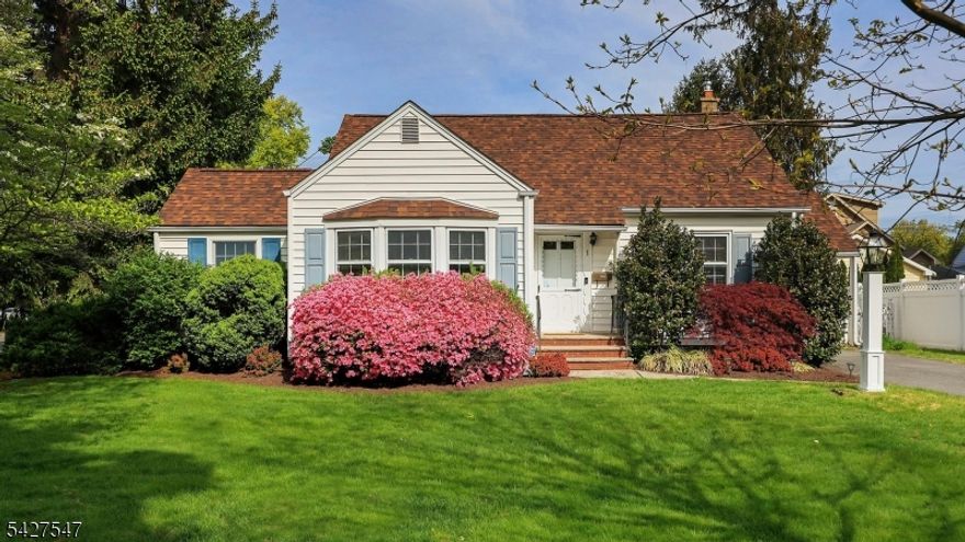 Charming and rich in character, this classic Cape Cod offers a beautiful blend of timeless detail and a flexible floor plan. Currently configured as three bedrooms, the home provides the option for a fourth bedroom with a versatile dining room that can easily serve as a guest room or home office. From the moment you enter, you'll appreciate the warmth and architectural charm, including gleaming hardwood floors, custom built-ins, graceful archways, and vintage details that add both style and personality. A welcoming family room enhances the home's comfortable and inviting feel. The thoughtful layout includes a convenient first-floor bedroom and full bath, while two additional bedrooms are located on the second level, offering privacy and separation of space. The unfinished basement provides excellent storage and potential for future expansion. Additional features include central air conditioning for year-round comfort.Set on an oversized .18-acre lot, the outdoor space offers endless possibilities for entertaining, gardening, or relaxing, complete with a deck, fenced yard, and attached one-car garage. Ideally located just steps from Bloomingdale Avenue School, with an easy route to Orange Avenue School and the Orange Avenue Pool, and convenient to parks, playgrounds, commuting options, and vibrant Downtown Cranford. Not in a flood zone. Offered as-is, but very well maintained, this is a rare opportunity to bring your vision to a charming home in a prime location.
