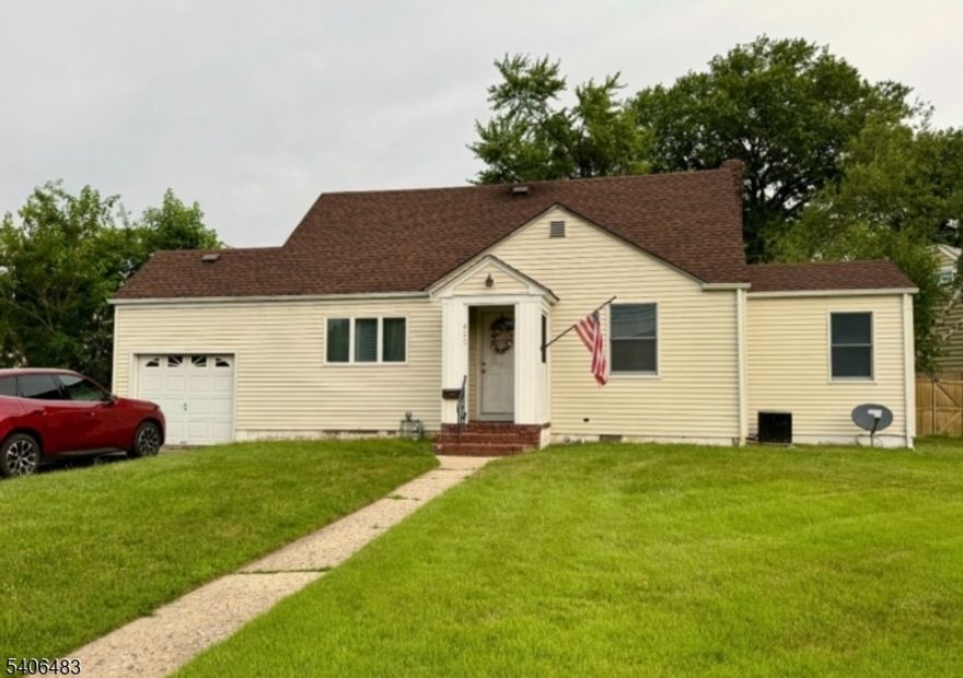 Welcome to this 4 bedroom, 2 bath home in the highly sought after area of Sunnyside, Linden. Home is currently rented to a long-time tenant. This home has two bedrooms on the first floor along with a large eat-in kitchen and full bathroom. Second floor has two large bedrooms and a second full bath. Attached one car garage has interior access to the full unfinished basement with laundry hook-up. The driveway is can accommodate about 3 cars comfortably. Home has newer roof and water heater.