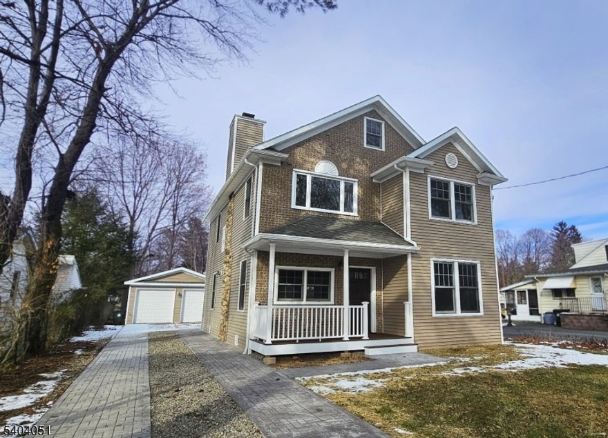 Beautiful New Construction, 4 bdrm's with 3 full baths, Large Open Gourmet Kitchen with Granite Center Island, Granite Countertops  and 2 Ovens! Radiant Heat Throughout 1st Floor, Radiant Heat in all Baths. High Ceilings throughout house, High Cathedral Ceiling in Master Bdrm, Double Sinks and Full Body Shower in Master Bath. Extra Large Room on Third Floor, Separate Heating Control in all Bedrooms.  Two Car Garage has Special 8' High Doors with Heating and Cooling as desired. The Boiler supplies the Hot Water for the Radiant Floors, the Baseboard Radiators and the House Hot Water.