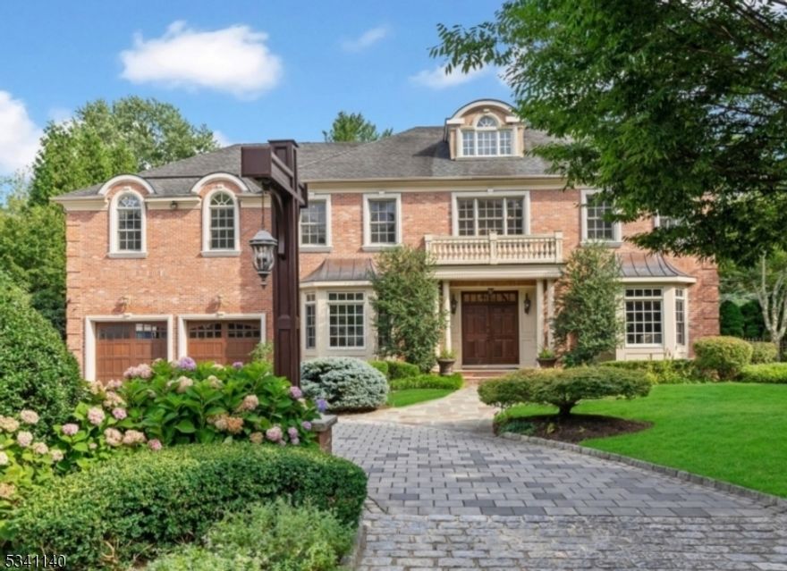 Stunning custom built home with 10' ceilings on 1st level, 11 zone radiant heated floors and Smart House features, and the highest level of attention to detail includes 6BR/6.3BA. An architecturally designed open concept 1st level w/ a gorgeous high-end chef's kitchen including Onyx backsplash, 36" Subzero refrigerator, 36" Subzero freezer, 48" DCS double oven w/ 6 burners & griddle, refrigerator drawers, warming drawer & wine cooler. Luxurious primary suite includes gas FP, 2 walk-in custom closets & spa-like bathroom w/ steam shower & soaking tub. Additional generous sized bedrooms include beautifully done en-suites. Finished lower level offers a home theatre & rec room while the 3rd level offers an office, exercise room/bedroom & bathroom. Beautifully landscaped backyard w/ southern exposure is an outdoor oasis including a gorgeous 23' x 50' heated, saltwater pool w/ remote safety cover, slide & waterfall. An outdoor kitchen, bathroom, expansive bluestone patio with cooling sprinklers, screened-in porch w/ TV, heaters & fireplace extend the relaxation for year round enjoyment! Additional features include Generac generator, central vacuum, skylights, Windsor windows, 3-car heated garage and 5 zone HVAC system. Smart house features include heated paver driveway & walkway, security system, HVAC system garage doors, Electronic Lift so it is a 3 car garage. A spectacular gem with every amenity & a resort-like backyard w/ stunning pool & great privacy.