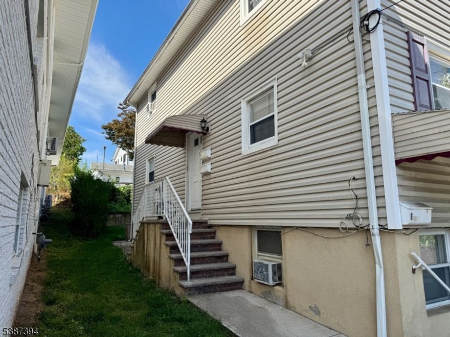 Renovated 2nd-floor, Large 2 BDR apartment featuring modern finishes and great amenities. This light-filled unit offers tiled floors, carpeted bedrooms with large closets, and an updated kitchen with stainless steel appliances, granite countertops, and a tile backsplash. Additional highlights include an in-unit washer/dryer, on-property parking space, and a private backyard. Nestled in the heart of Garfield on the bus line and just minutes away from the Plauderville train station making it an easy commute to NYC, close to major highways, shopping & restaurants! Move-in ready and designed for comfort and convenience. No pets or smoking allowed. Interview, good credit, proof of income required. Don't miss this lovely great sized unit, in a great location your new home! Schedule your showing today!