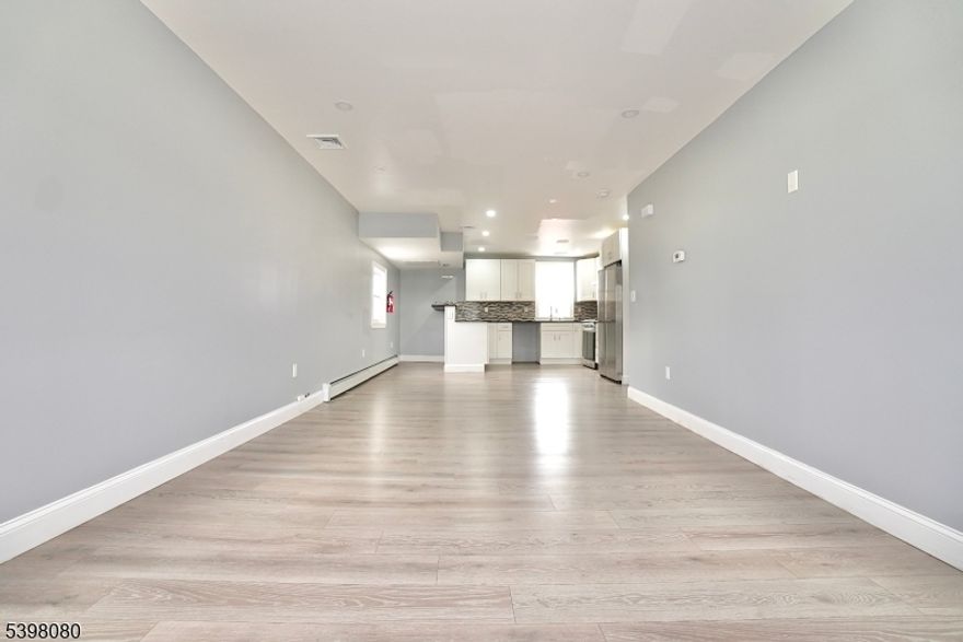 Beautifully renovated 2-bedroom apartment in the heart of Lodi, NJ. This modern unit features a bright, open layout with two generously sized bedrooms and stylish updates throughout. The kitchen and living areas offer a clean, contemporary feel, perfect for comfortable everyday living. Enjoy year-round convenience with both central air, central heat, and additional baseboard heating. Located close to shopping, dining, public transportation, and major highways, this apartment offers a great blend of comfort and accessibility. A must-see that's ready for immediate move-in!